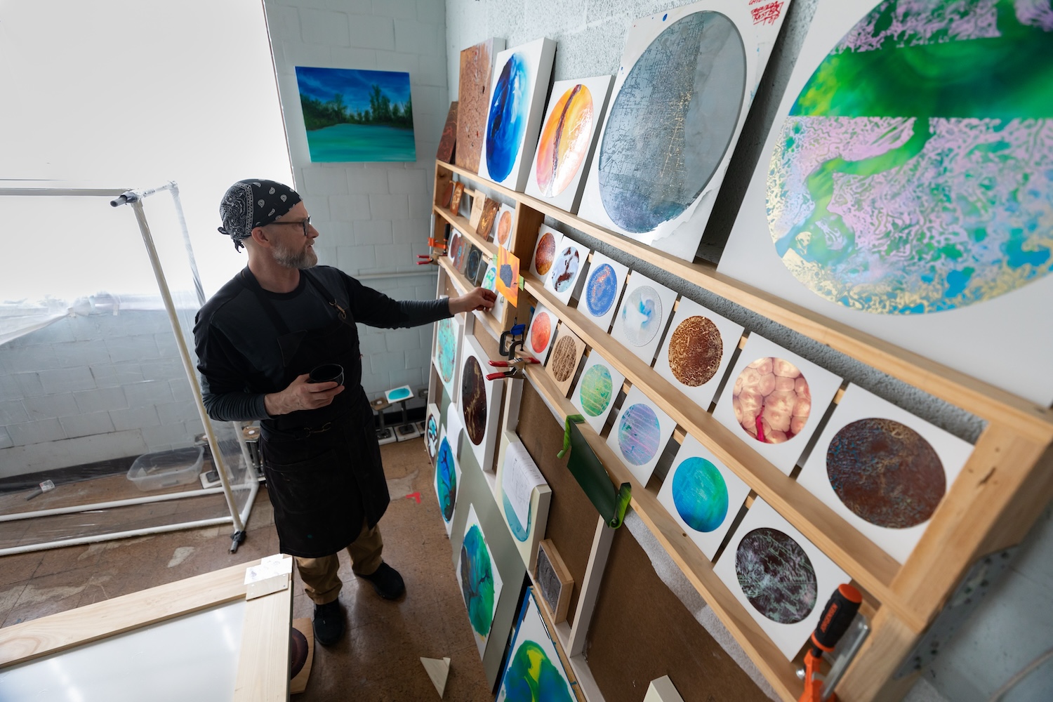Art professor John Sabraw of Ohio University makes art with pigments captured from polluted waer in Sunday Creek